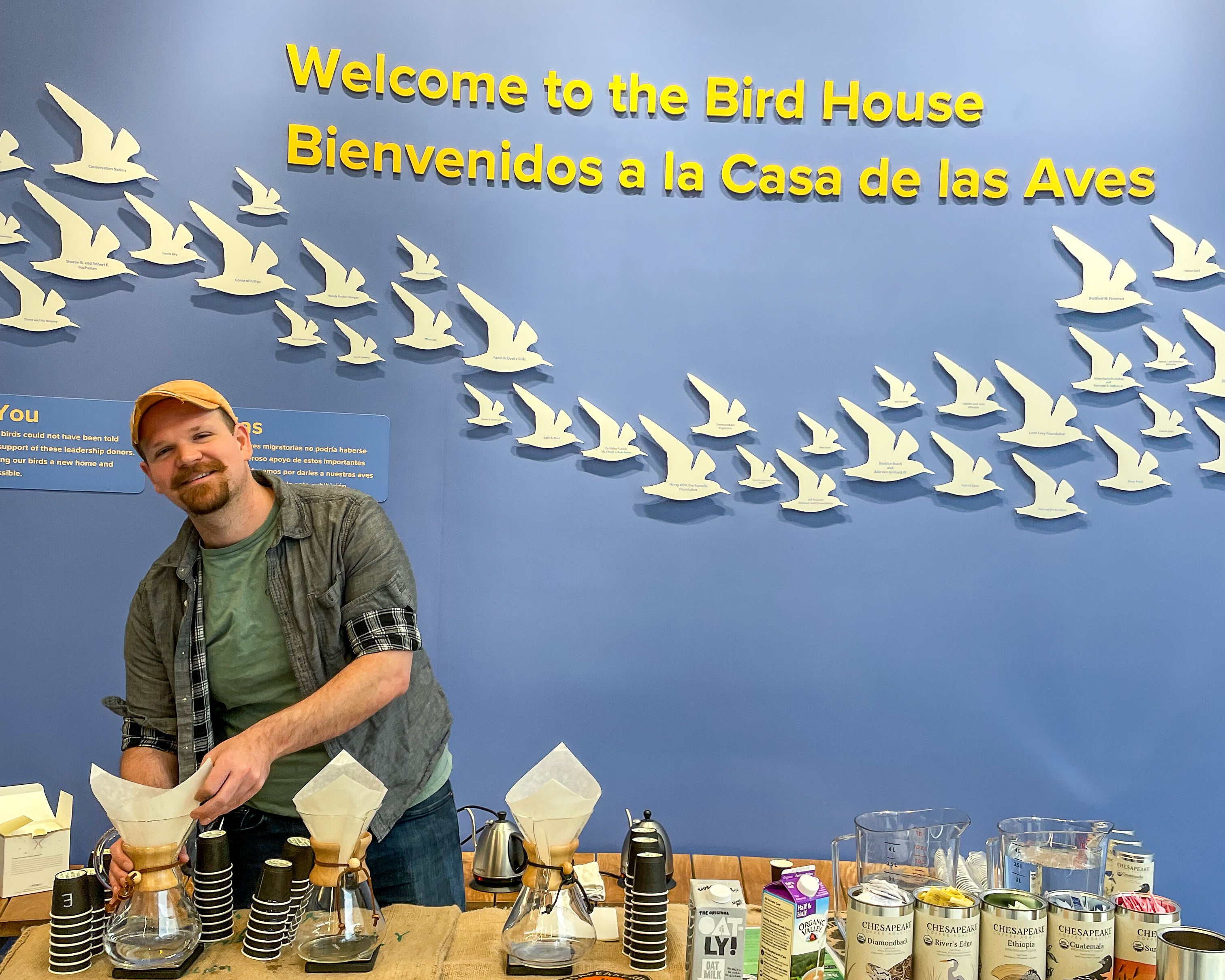 A man making pour over coffee at a coffee sampling